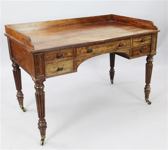A Victorian mahogany writing table, W.4ft D.2ft 4in. H.2ft 9in.